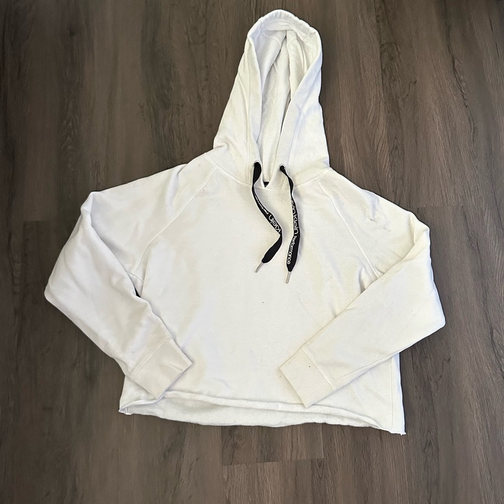 Calvin Klein cropped sweat shirt. Never worn and in perfect condition.
